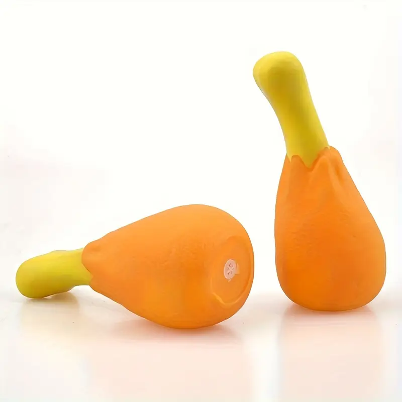 A squeaky chicken leg dog toy - made of durable, non-toxic rubber.